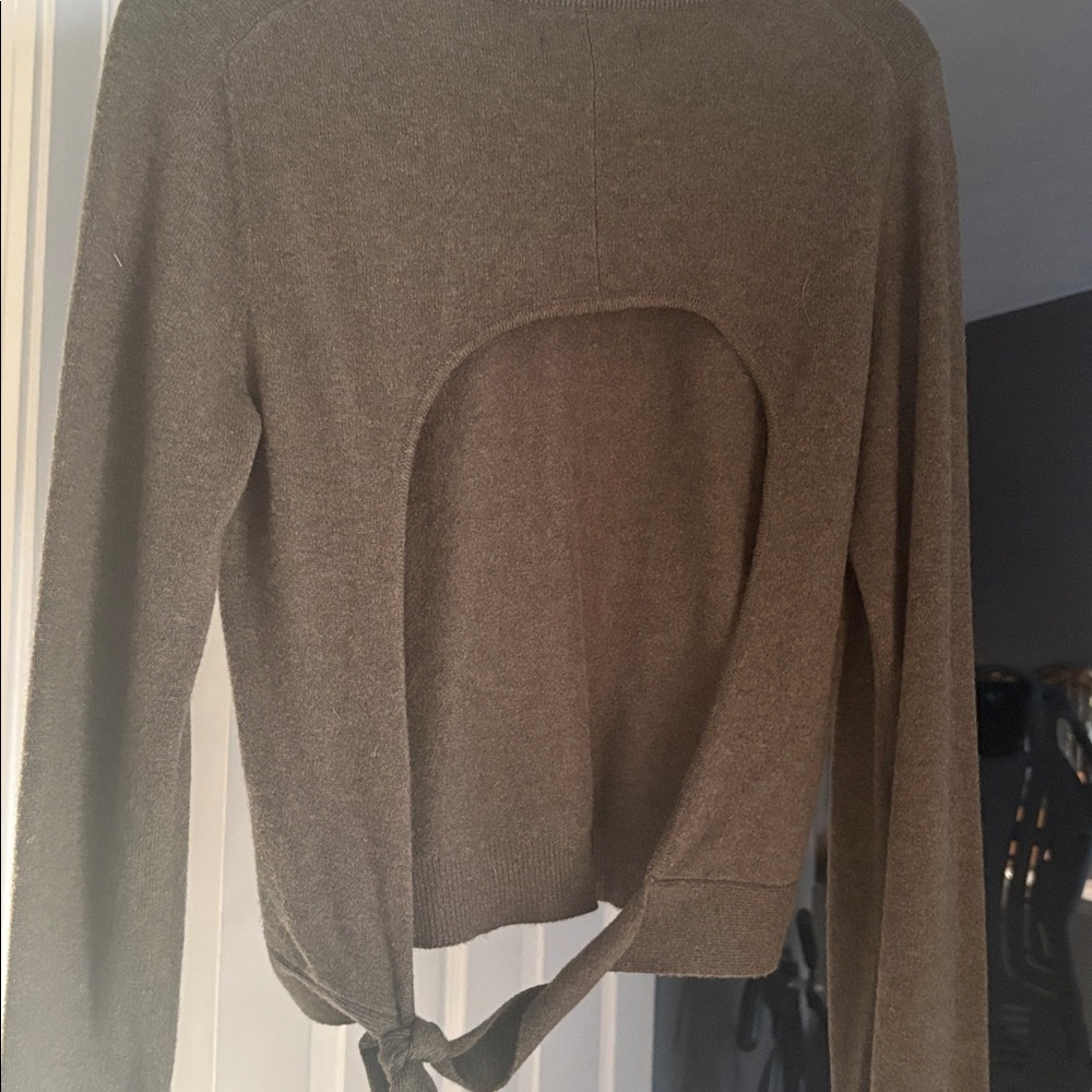 Naadam olive green 100% cashmere sweater. Cut out back with tie at bottom.